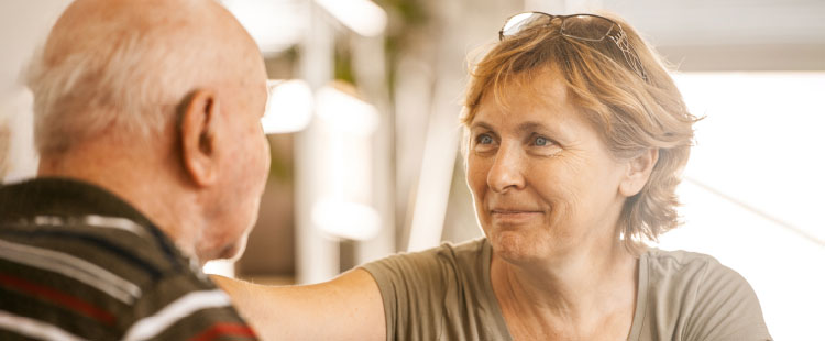 Memory care resident with caregiver | Presbyterian Village Athens