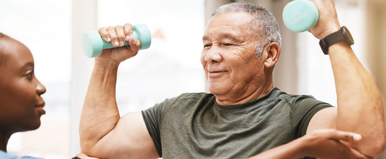 Rehab resident lifting weights | Presbyterian Village Athens