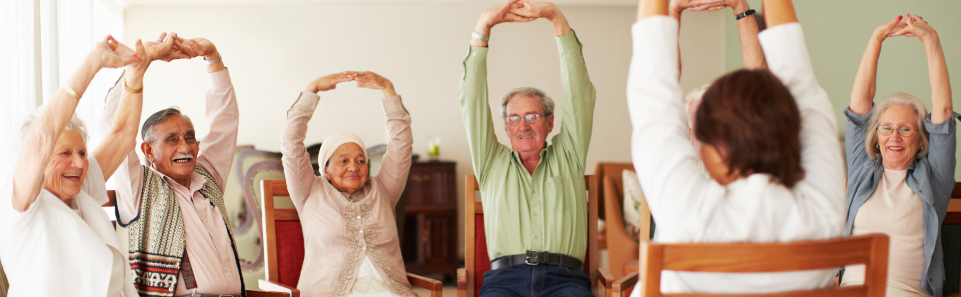mc_features_image_full_width Seniors participate in a stretching class together.